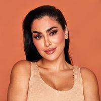 Huda Beaty GloWish Soft Radiance Bronzing Powder Mini 04 Deep Tan